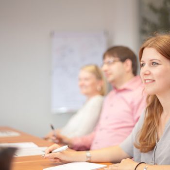 Photo: employee listening to a customer