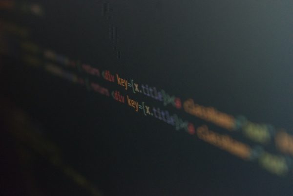 Snipped source code (decorative) by Thomas Tasted @Unsplash