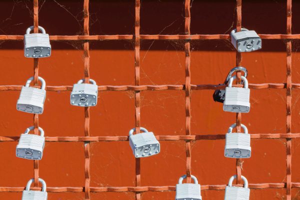 Stock Picture: padlocks on a fence via Unsplash